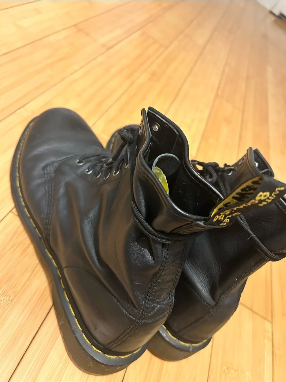 Dr. Martens Black Leather 8-Eye Lace-Up Boots with Yellow Stitching